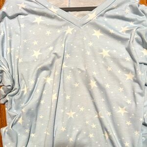Boutique light blue shirt with stars